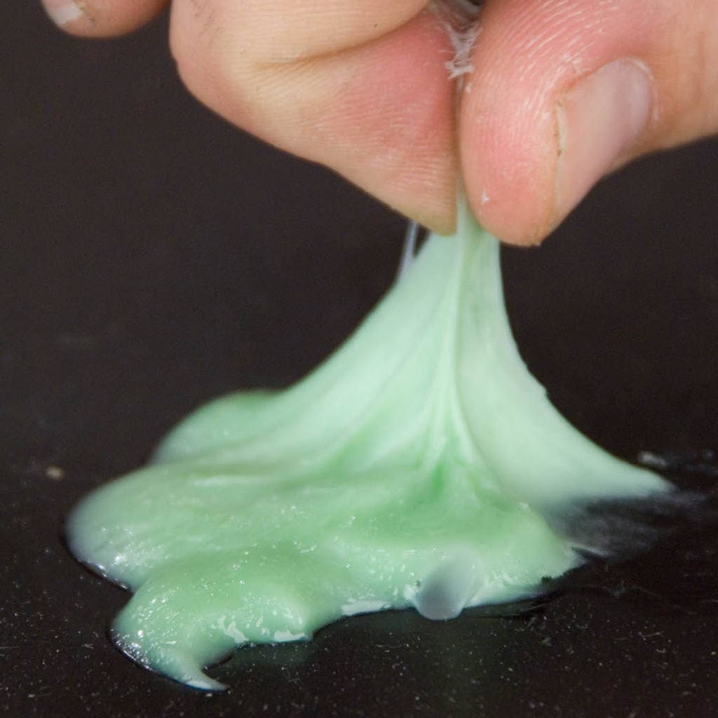 Use 70% Isopropyl Alcohol to clean up Green Glue.